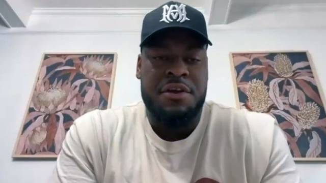 Kansas City Chiefs Lineman Trey Smith comforts young boy using WWE Title Belt after Super Bowl Parade shooting